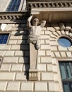 Sculpture of the strongman supporting the balcony of the Palace