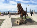 Vladivostok, Russia, August, 26, 2023. Sculpture of a tiger made of scrap metal on the embankment of the Sports Harbor