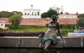 Sculpture of tired tourist near novgorod kremlin