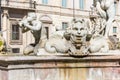 Sculpture of a triton, greek God. The Moor Fountain in Navona Square, Rome, Italy.