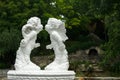 Sculpture of two angels in the park. Royalty Free Stock Photo