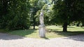 A sculpture in a vineyard