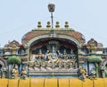 The sculpture of Vishnu with Lakshmi and other gods on one of the walls of the Indian temple Shriranganath, Trichy