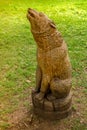 Sculpture of a wolf from a tree. Wooden wolf in the Park Royalty Free Stock Photo