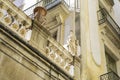 Sculpture of woman out of stone at a balcony in Barcelona, Spain. Elements of architectural decoration of buildings. Royalty Free Stock Photo