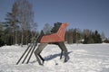 Sculpture of a wooden red horse