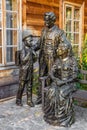 Sculpture of young Stefan Zeromski, polish literate, and poet, with parents - by sculptor Slawomir Micek at Zeromszczyzna historic Royalty Free Stock Photo