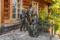 Sculpture of young Stefan Zeromski, polish literate, and poet, with parents - by sculptor Slawomir Micek at Zeromszczyzna historic