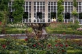 Sculptured fountain in a rose garden Royalty Free Stock Photo