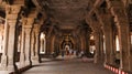 Sculptured Pillars and Visitors at Sri Ranganathaswamy Temple, Srirangam, Trichy, Tamil Nadu,