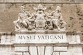 Sculptures above entrance to the Vatican Museums.