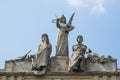 Sculptures of angel and actors on roof of Arena del Sole in Bologna