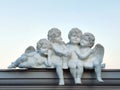 Sculptures of child angels sitting on the roof