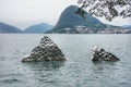 Unusual sculptures in the water of Lake Lugano in Parco Ciani