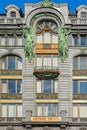 Sculptures on the facade of Singer House, Saint-Petersburg, Russ Royalty Free Stock Photo