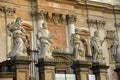 Sculptures on  fence of Catholic church of Holy Apostles Peter and Paul, baroque architectural monument of 1635 on Grodskaya stree Royalty Free Stock Photo