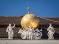 Sculptures with a golden globe on roof of Austrian National Library, Vienna, Austria Royalty Free Stock Photo