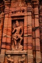 Sculptures of hindu gods on facade of 7th century temple carved walls in Pattadakal Royalty Free Stock Photo