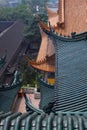 Sculptures of mythical beasts can be seen on the roofs of some temple buildings