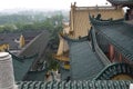 Sculptures of mythical beasts can be seen on the roofs of some temple buildings