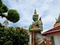 The sculptures of mythical giant demons, Thotsakan, guarding the eastern gate of the main chapel of Wat Arun Ratchawararam