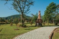 Sculptures and paved pathway in a garden