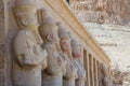 Sculptures of pharaohs near the temple of Queen Hatshepsut Royalty Free Stock Photo