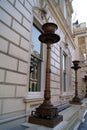 Sculptures of raised urns torches in plinths decoration ornaments