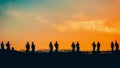 Sculptures of saints in Vatican, silhouette on the orange sky background. Panorama