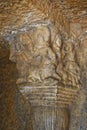 Sculptures on the top left pillar of Vihara Cave No. 20 with rock-cut at Bhaja Caves, Ancient Buddhist built in 2nd century BC, Royalty Free Stock Photo