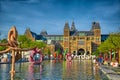Sculptures in water near Rijksmuseum Amsterdam museum in Holland Royalty Free Stock Photo