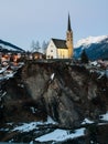 Scuol church in winter time evening Royalty Free Stock Photo