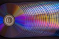 sd and dvd disks on a dark background. large stack. Royalty Free Stock Photo
