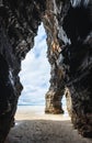 Sea arch and cave along the Irish coast at low tide Royalty Free Stock Photo