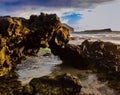 Sea Arch on The Volcanic Shoreline of Makapu\'u Beach Royalty Free Stock Photo