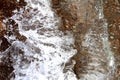 Sea background. Waves on the background of pebbles. Seashore