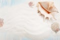 Sea background with white sand and blue painted wood, starfish, shells Royalty Free Stock Photo