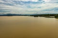 Sea backwater with mangrove forest and bright sky