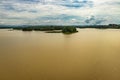 Sea backwater with mangrove forest and bright sky