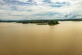 Sea backwater with mangrove forests and bright sky