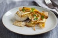 Sea bass fillet with parsnip crisps Royalty Free Stock Photo