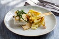 Sea bass fillet with parsnip crisps Royalty Free Stock Photo