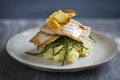 Sea bass fillet with parsnip crisps Royalty Free Stock Photo