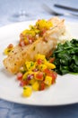 Sea bass with mango salsa Royalty Free Stock Photo