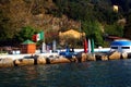 Palmaria Island: bathing establishment with Italian flag bunk rocks and bunker Royalty Free Stock Photo