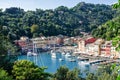 Sea bay with beautiful picturesque village called Portofino. Small marina port at the foot of mountain with a beautiful