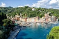 Sea bay with beautiful picturesque village called Portofino. Small marina port at the foot of mountain with a beautiful