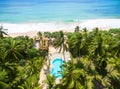 Sea beach, coconut palm trees and hotel pool, Sri Lanka. Aerial view of scenic resort Royalty Free Stock Photo