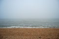 Sea beach in heavy fog