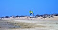 Paraglider on the sea beach